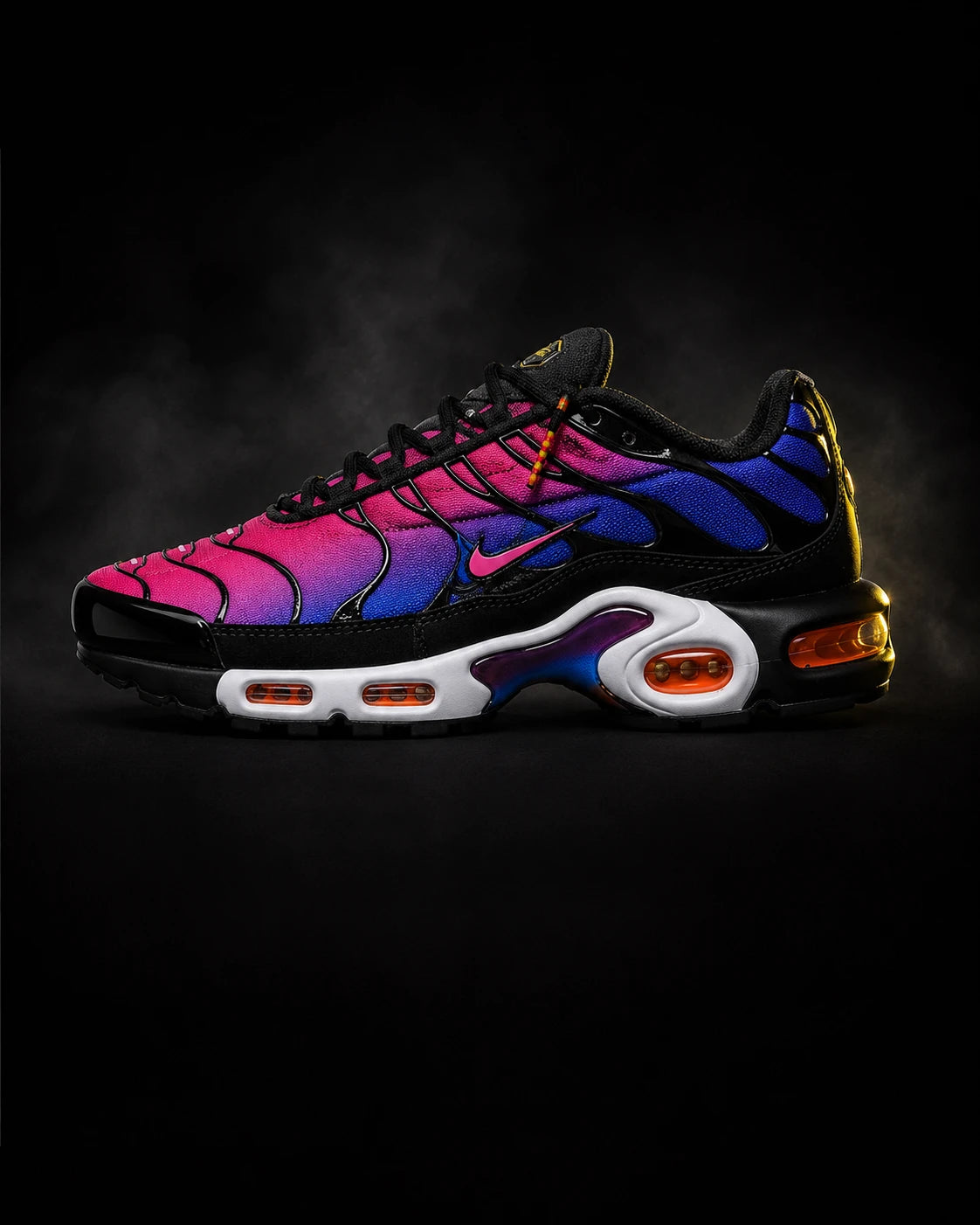 Urban Kinetic Wear premium UK streetwear trainer — TN FC Barcelona Patta collector colourway with pink-to-blue gradient on a moody atmospheric studio backdrop